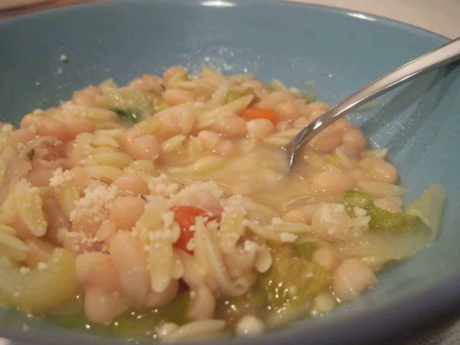 This is a whole-meal soup that draws its hearty peasant flavor from beans, onions, garlic, celery, carrots, ham, tiny pasta, and escarole. via @Mooreorlesscook