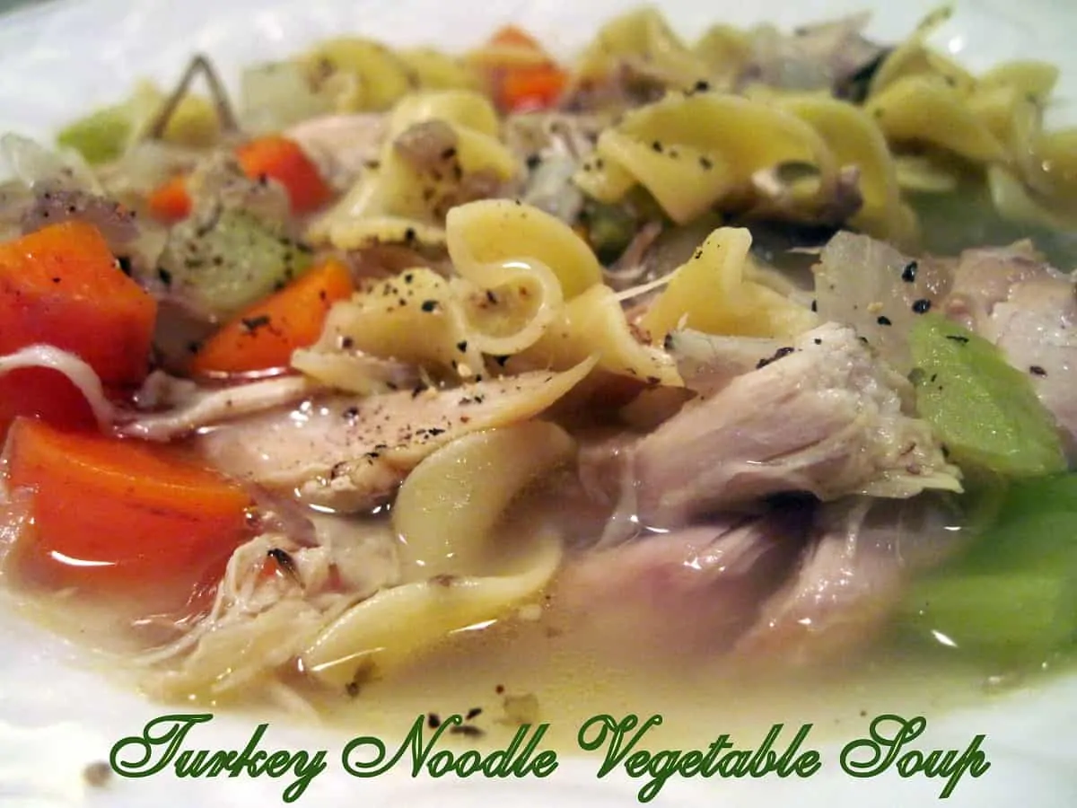 Tender chunks of leftover turkey, carrots, onions, celery, and noodles are simmered in delicious homemade turkey stock. #mooreorlesscooking #soup #turkeyvegsoup #turkeynoodlevegsoup via @Mooreorlesscook