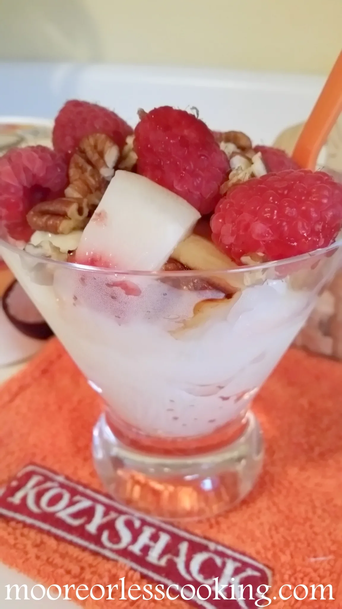 Kozyshack Rice Pudding Topped with Grilled Peaches, Raspberries and Pecans