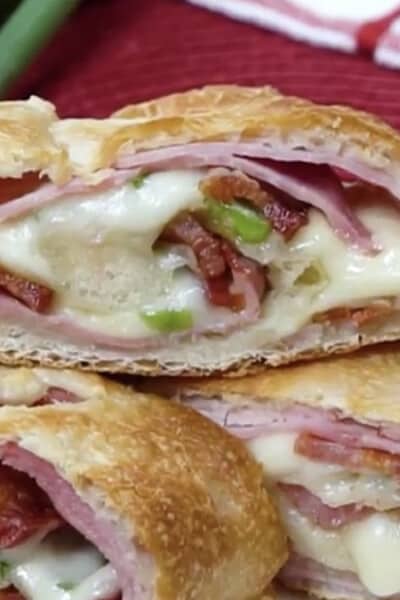 sliced stromboli filled with bacon ham and cheese