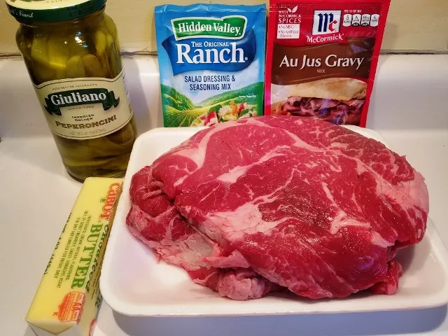 5 ingredients roast, butter, pepperoncinis, ranch mix, au jus gravy,  Slow Cooker Mississippi Pot Roast 