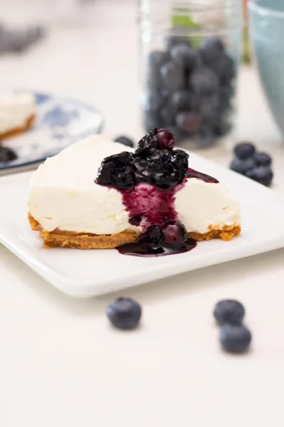 slice of cheesecake with blueberries