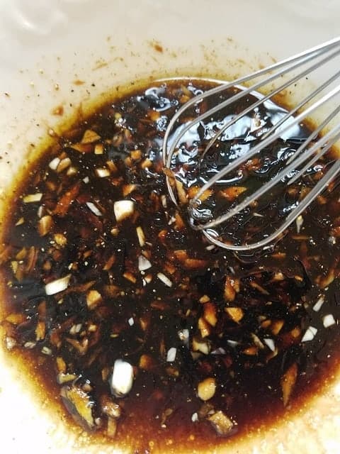 whisk marinade ingredients together in a bowl