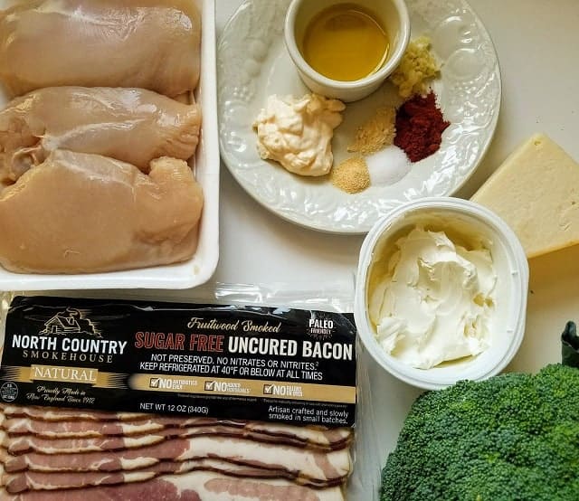 all of the ingredients for Keto Stuffed Bacon Wrapped Chicken