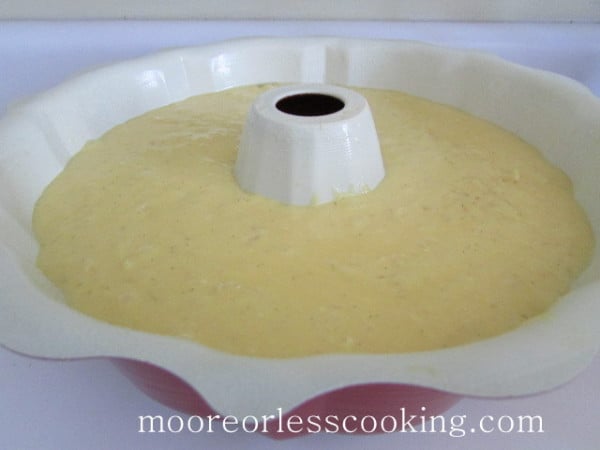 Pineapple Bundt Poke Cake batter in bundt pan