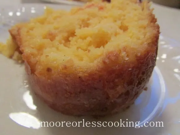 Pineapple Bundt Poke Cake slice of cake on small white plate