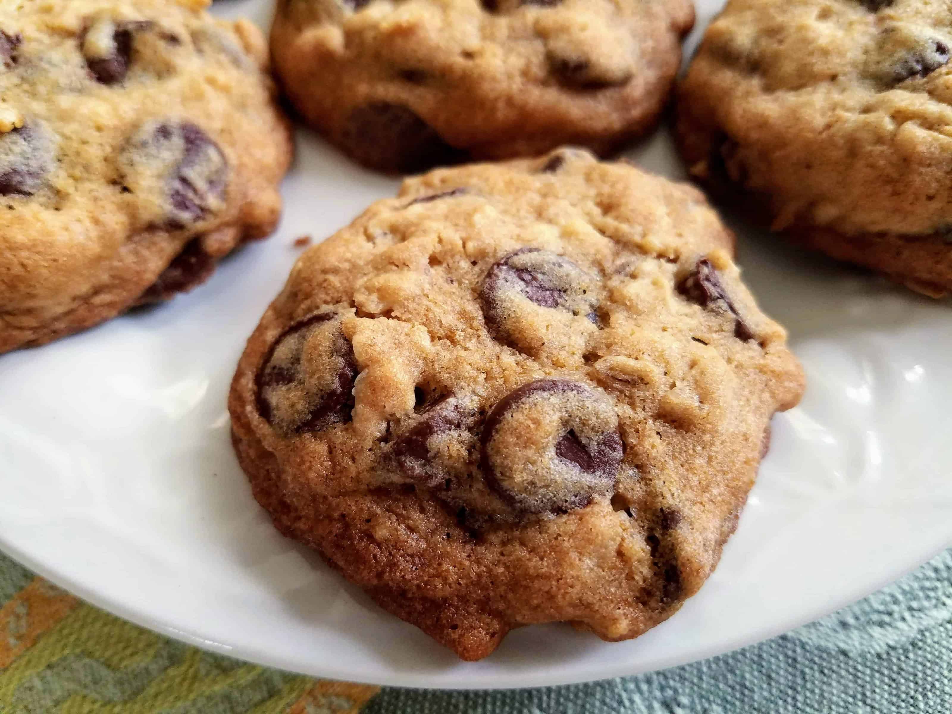 Soft and Chewy Oatmeal Chocolate Cookies will be your new favorite cookie! Packed with oatmeal and chocolate chips in every bite, it’s the best chewy cookie ever! #BakeBetterCookies #CollectiveBias #ChewyChocolateChipCookies via @Mooreorlesscook