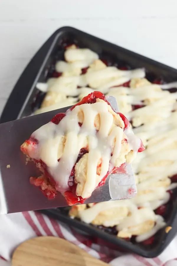 Cherry Pie Bar served out of the pan with a spatula