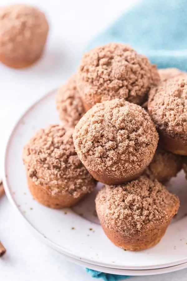 Best Cinnamon Muffins Ever! These Best Ever Cinnamon Muffins have a cinnamon sugar streusel topping. These fluffy moist muffins are so quick to make!  Recipe makes 12 muffins so share them with your friends and family! via @Mooreorlesscook