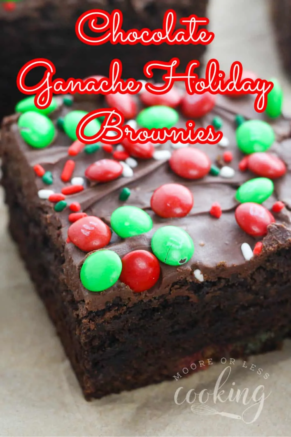 The Best fudge-y and incredibly moist Christmas Brownies covered in a smooth and silky chocolate ganache and Red and Green M&M's! via @Mooreorlesscook