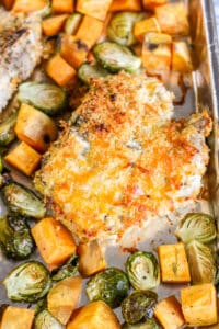 Sheet Pan Crispy Cheddar Pork Chops with Brussels Sprouts and Sweet Potatoes