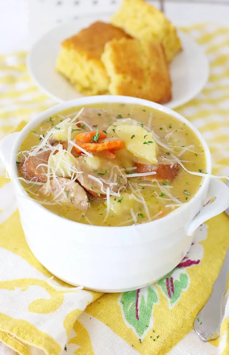 bowl of kielbasa soup and side of cornbread