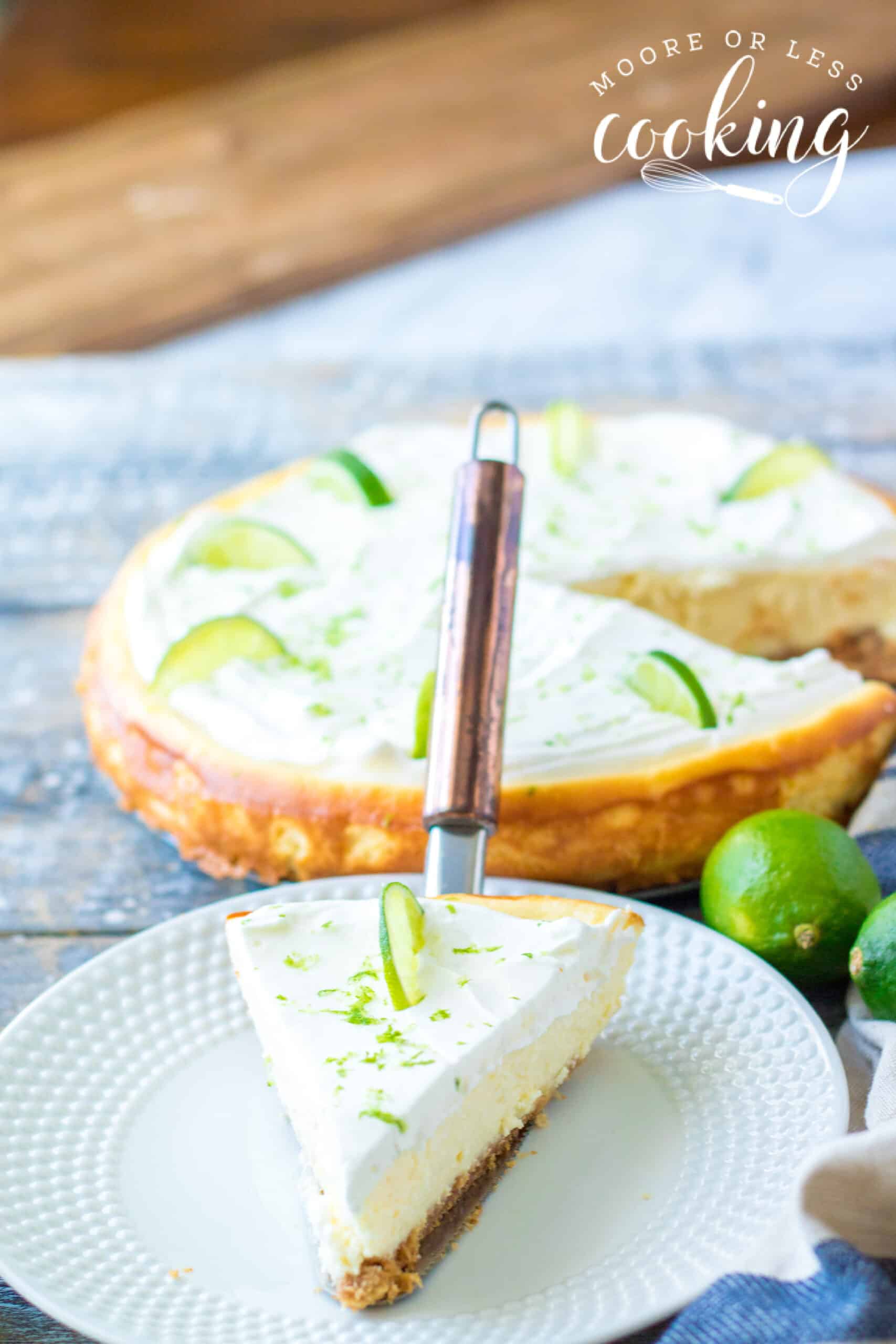 slice on cake server of Cheesecake Factory Copycat Key Lime Cheesecake