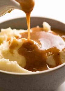 gravy poured bowl of mashed potatoes