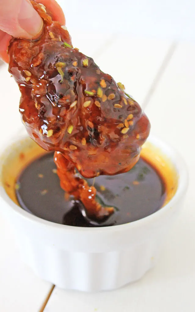 Air Fryer Korean BBQ Chicken drum stick dipped in sauce