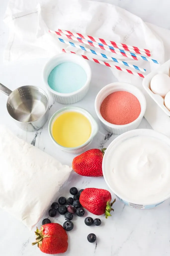 All of the ingredients set out ready to make a Flag Poke Cake