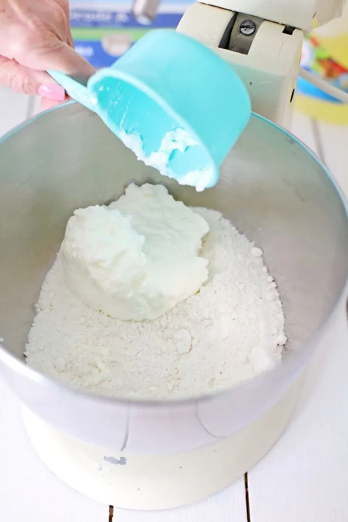 In the mixing bowl of a stand mixer, add the Cake mix, Yogurt, and Key Lime Juice, and mix on low just until blended.  
