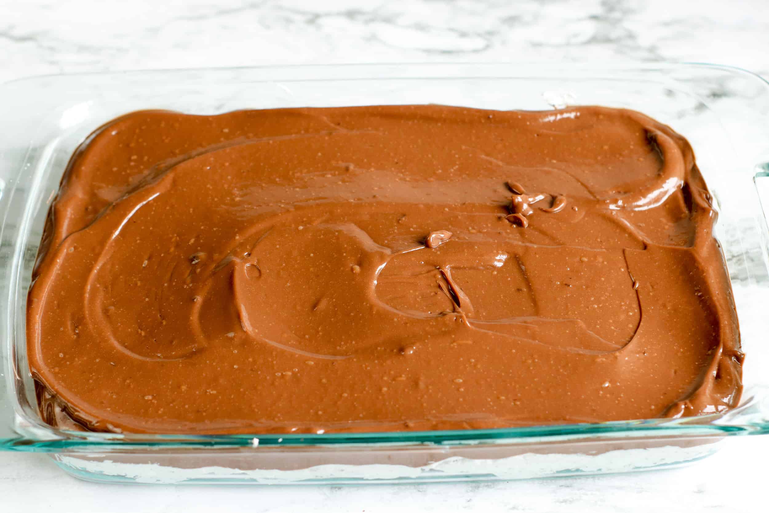 add box of chocolate pudding and milk, stir, then add layer