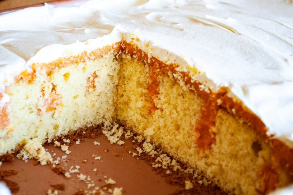 Pumpkin cheesecake jello poke cake sliced