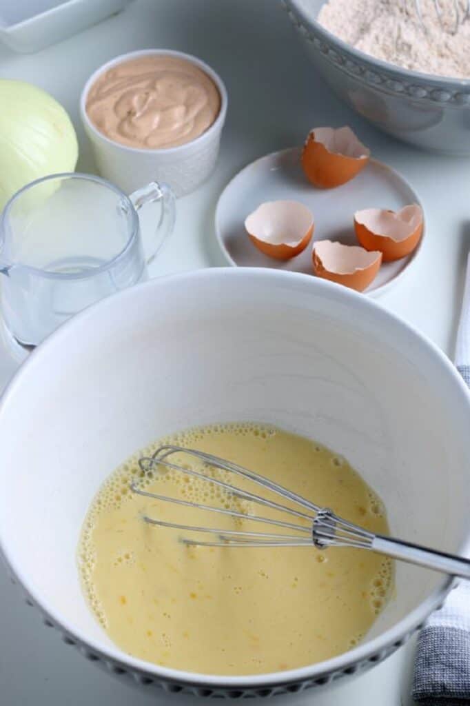whisk egg mixture in a bowl