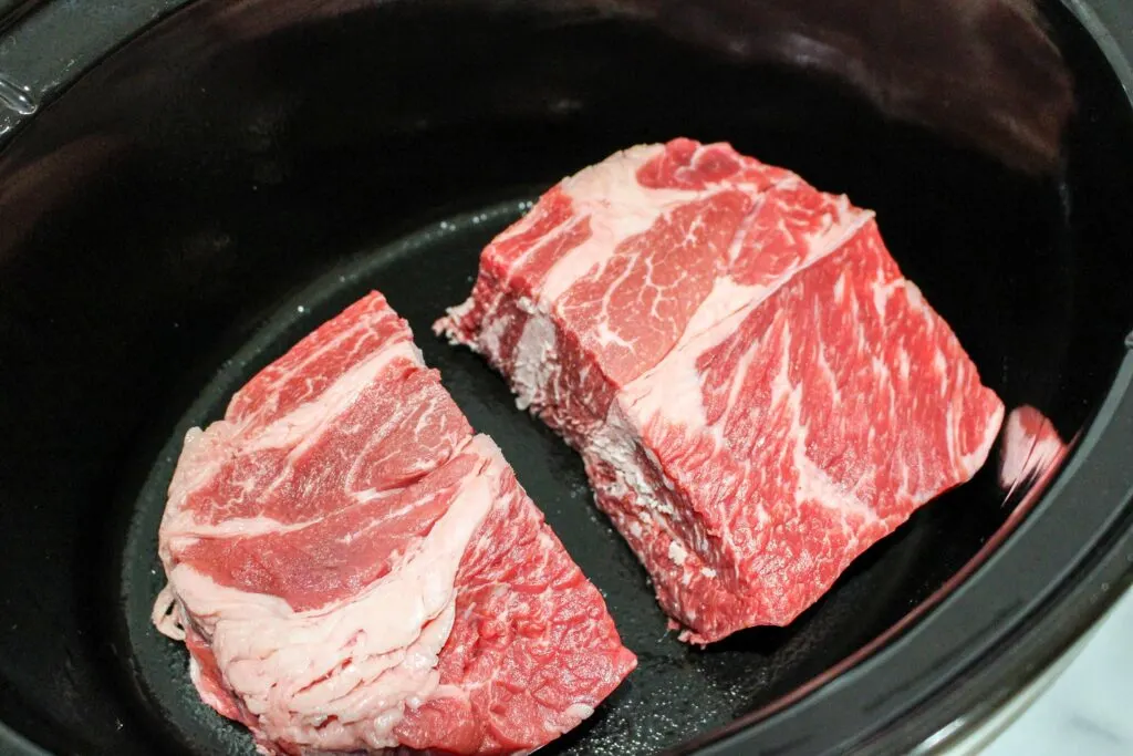 two ends of beef roast in a crock pot slow cooker