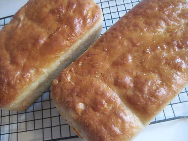 English Muffin Bread on a cooling rack ready to be sliced