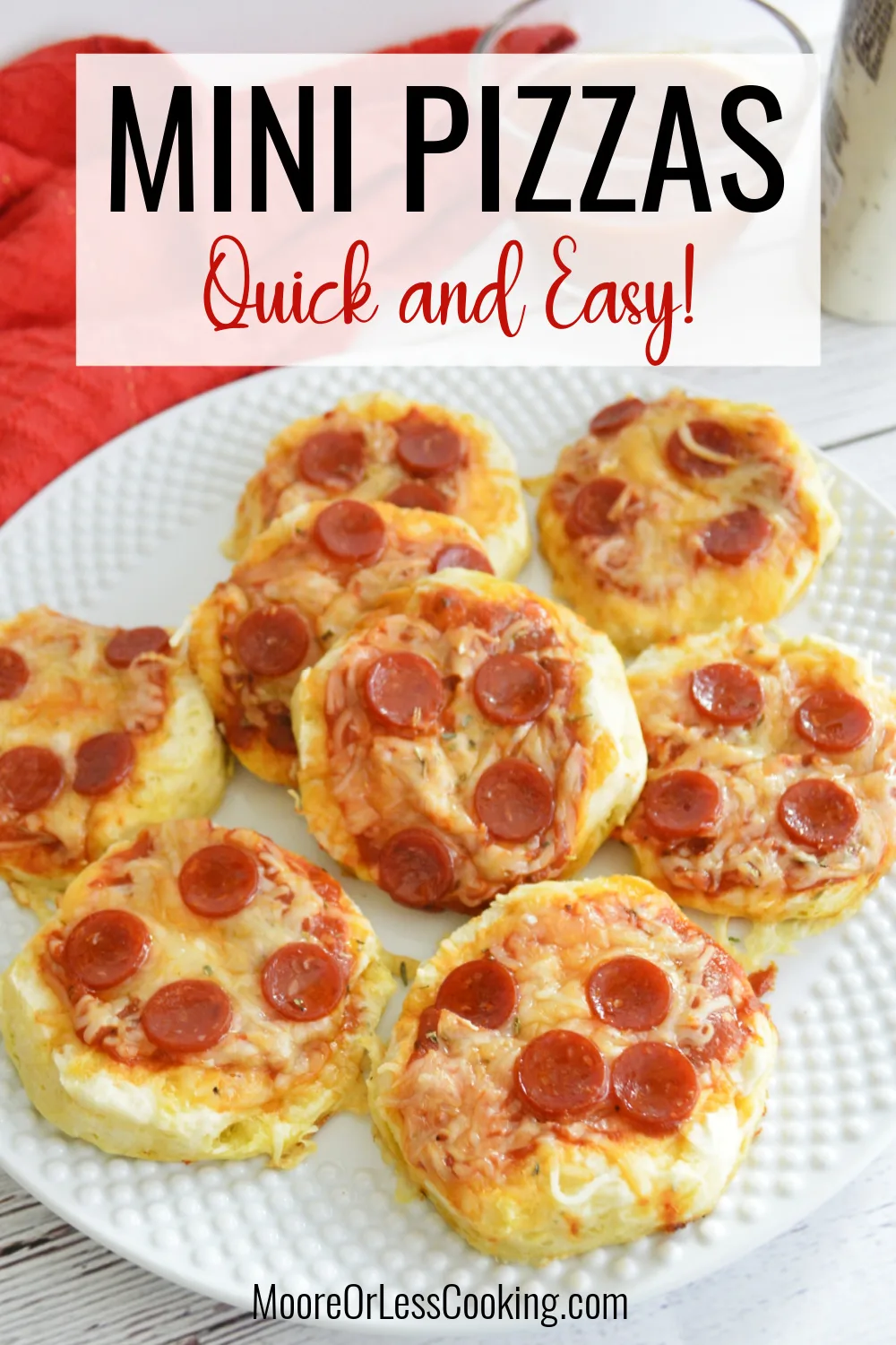 Quick and easy, these mini pizzas are perfect for snacks, lunches, appetizers, or even family pizza nights! Refrigerated biscuits serve as individual crusts, so get all your favorite toppings ready to make these simple and savory mini pizzas. via @Mooreorlesscook