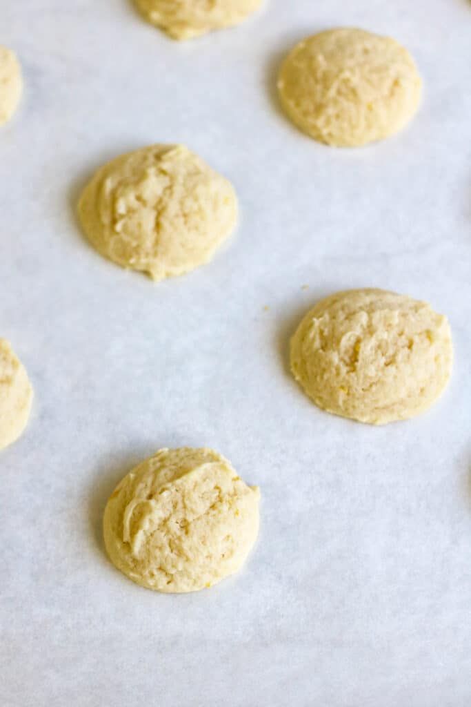 vertical shot Lemon Cookies dough on wax paper 