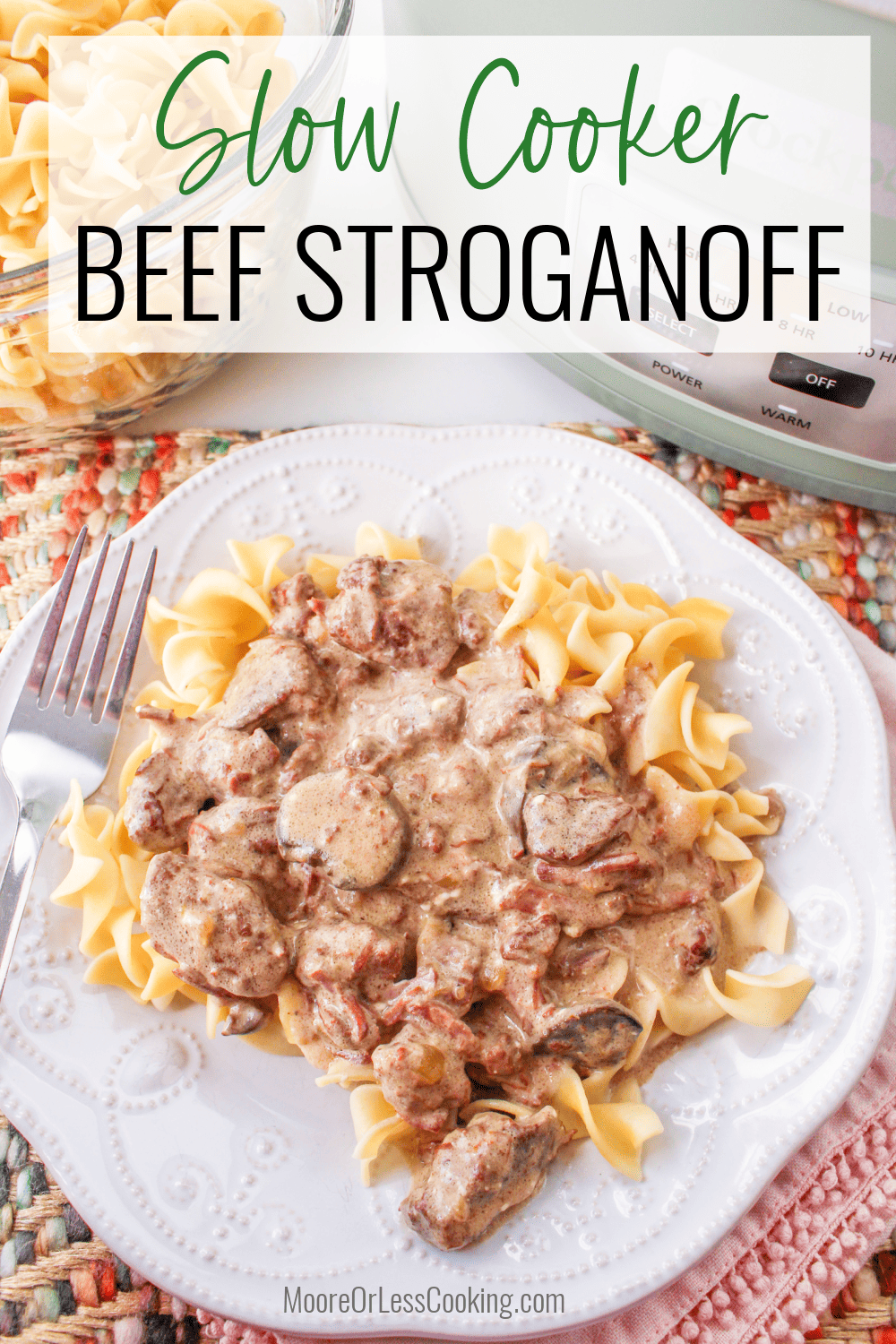 This easy Slow Cooker Beef Stroganoff recipe will give you tender chunks of beef in a savory and creamy sauce that you'll serve over egg noodles for a family favorite meal that's perfect for busy days. via @Mooreorlesscook
