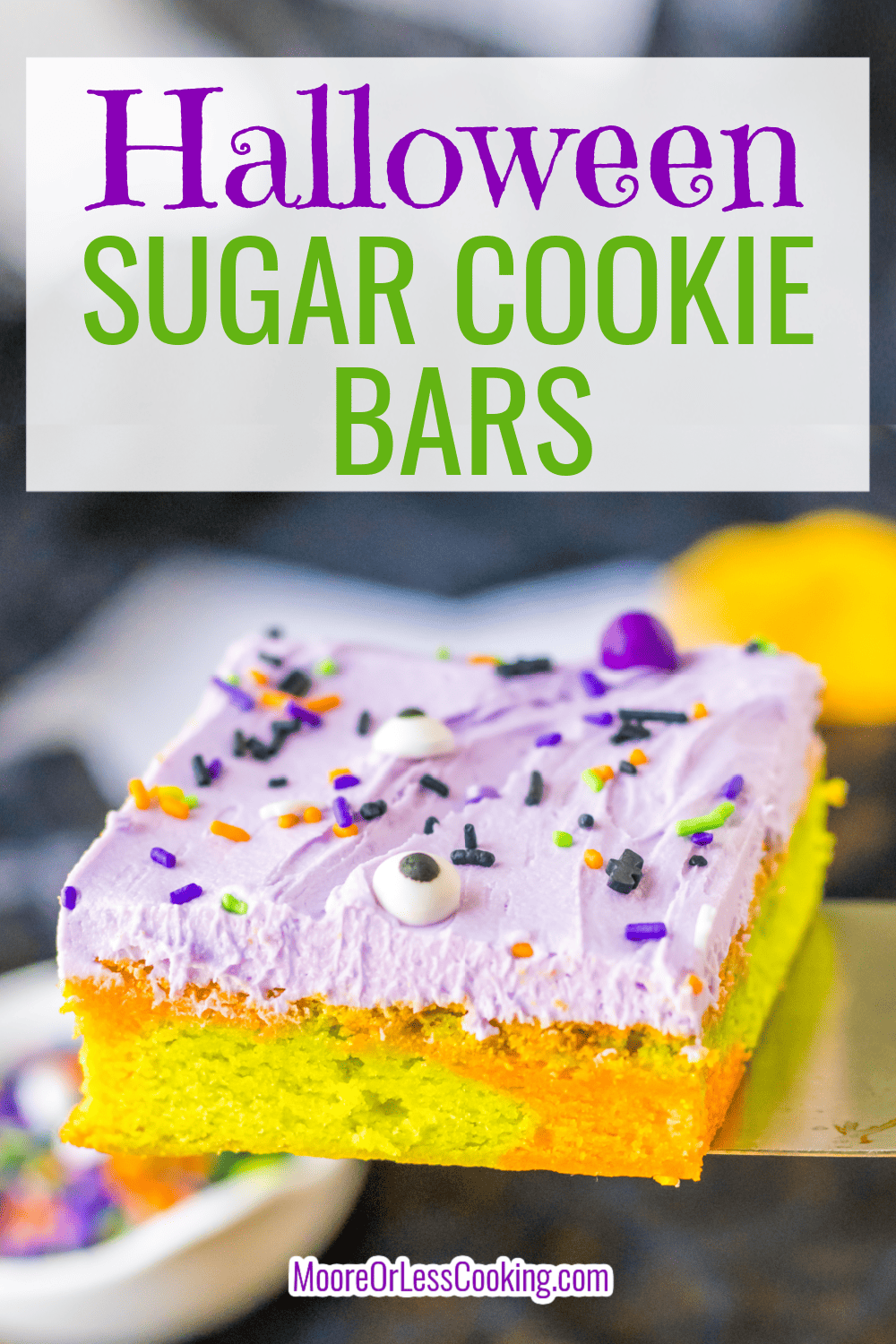 Halloween Sugar Cookie Bars are a colorful spooky treat! Thick chewy marbled sugar cookie bars are flavored with vanilla and a touch of almond extract. Topped with a purple buttercream, and topped with colorful spooky sprinkles. Always a hit at any Halloween get together. via @Mooreorlesscook