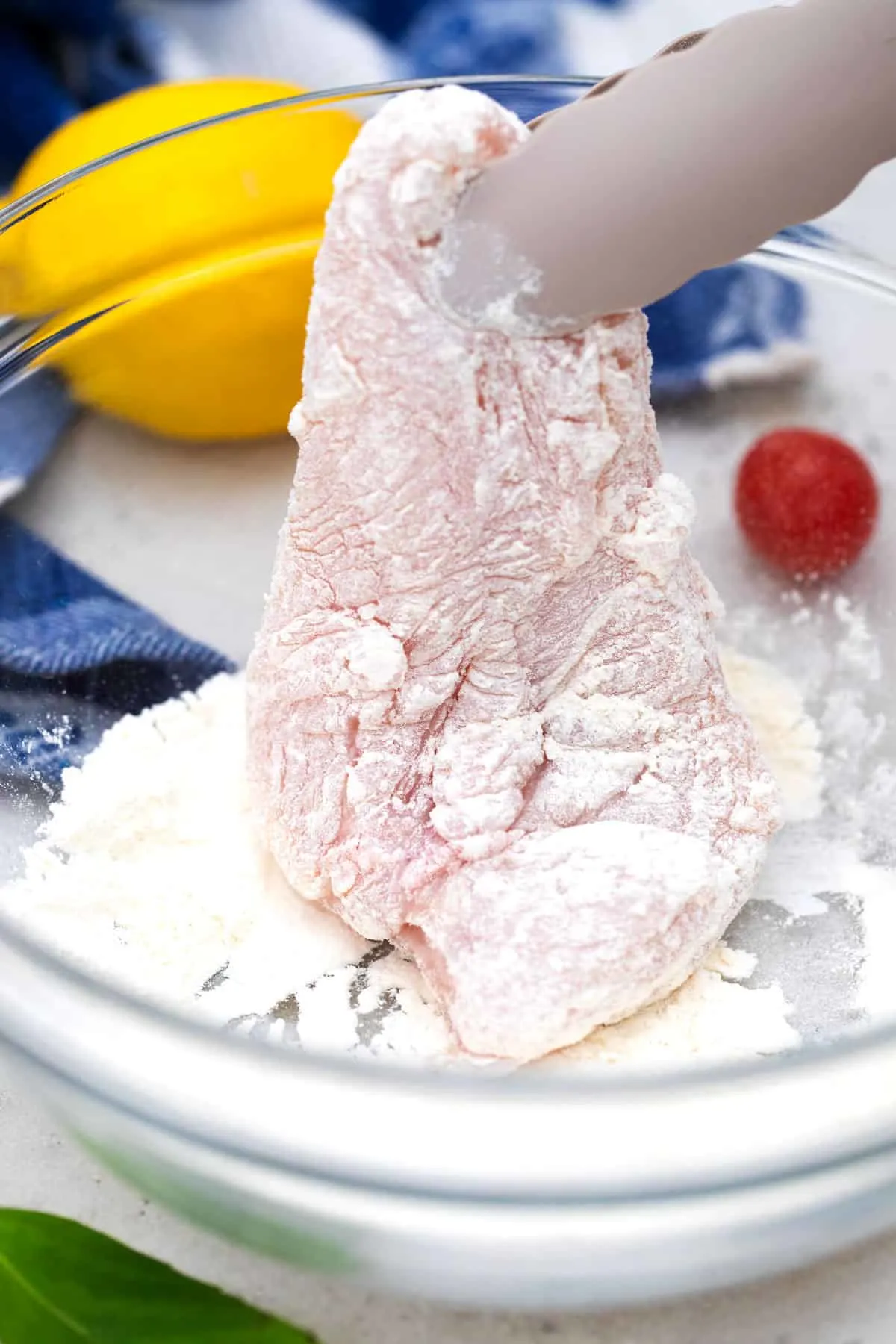Dredge chicken with flour