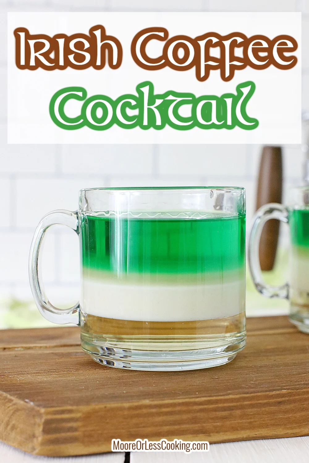 This eye-catching dessert cocktail is perfect for celebrating St. Patrick's Day! It's a fun way to add green to the classic Baileys Irish coffee drink and give it a festive look in a clear glass. The secret is using a cocktail layering tool that makes it easy to achieve as you pour each liquid in the glass. How easy is that? Up your Irish Coffee game with this creative cocktail! via @Mooreorlesscook