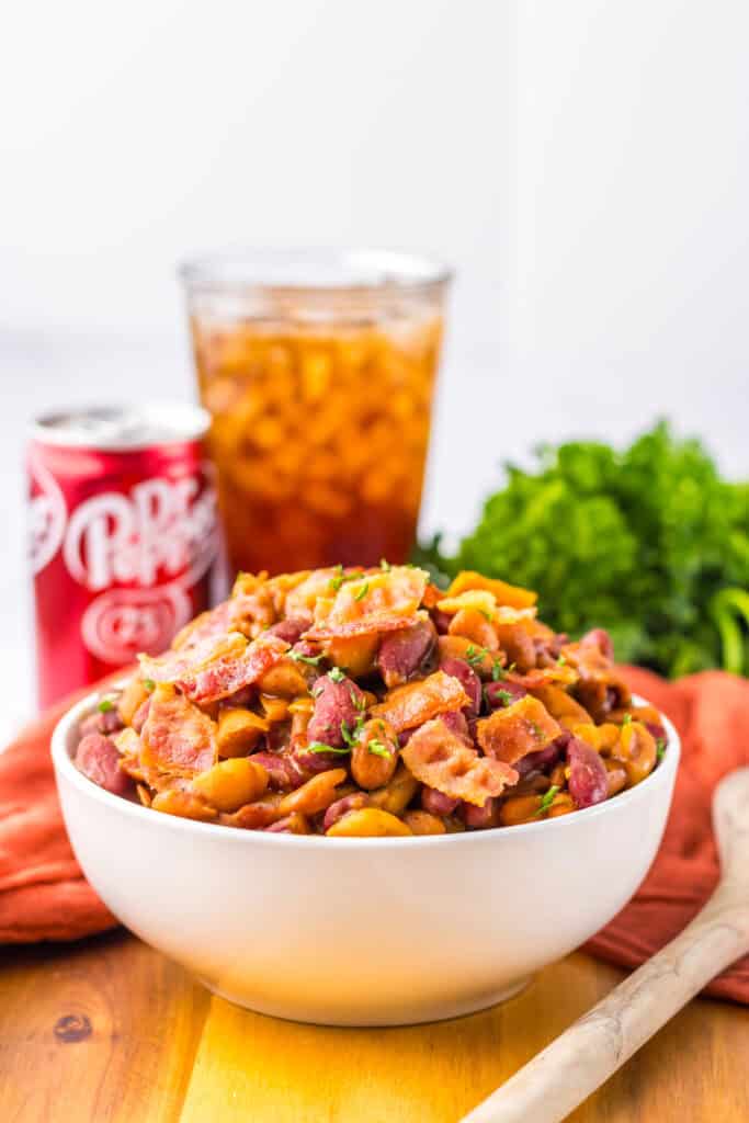 Slow Cooker Dr. Pepper Baked Beans served in white bowl