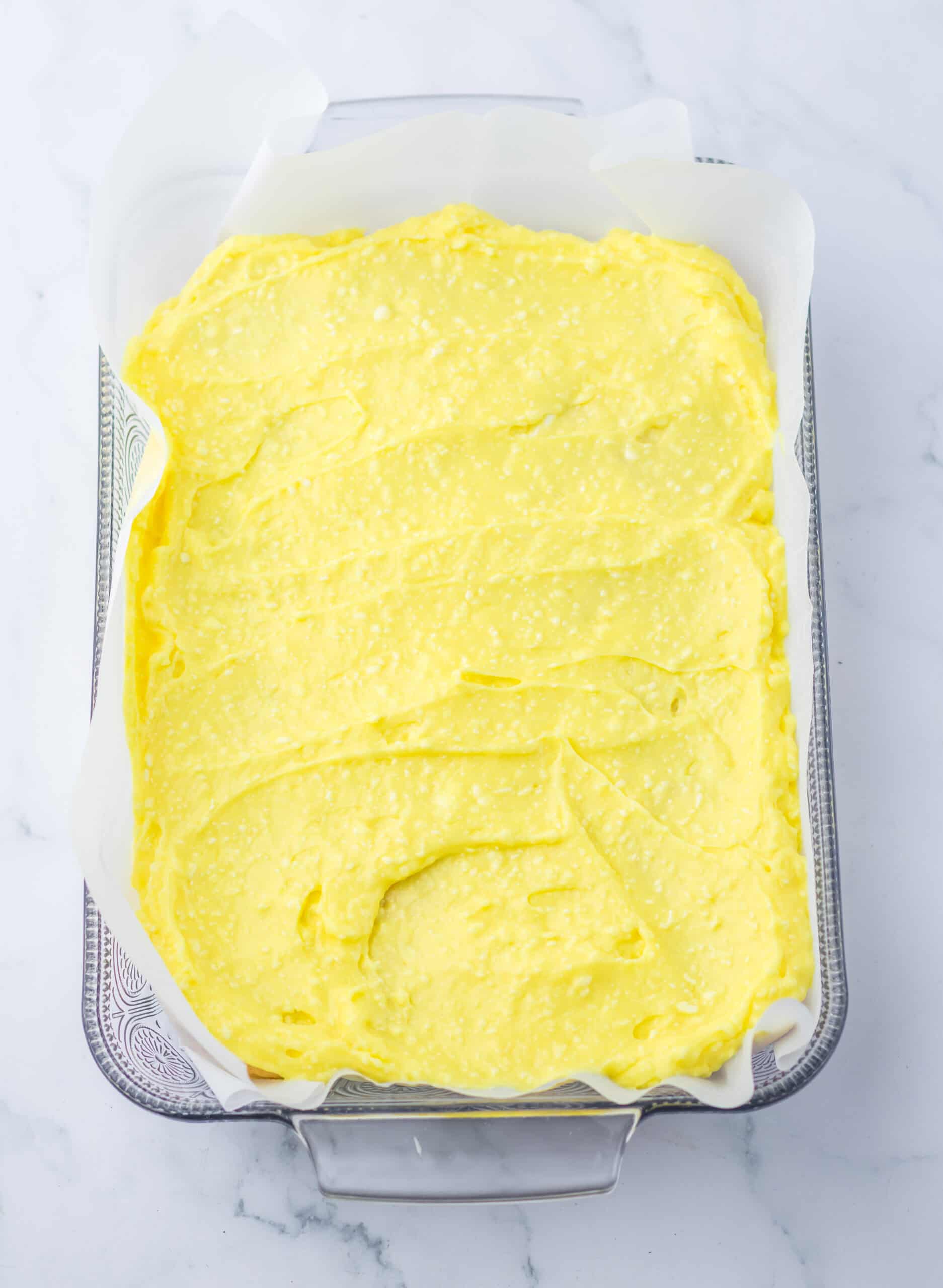 Lemon Icebox Cake spoon half of pudding mixture