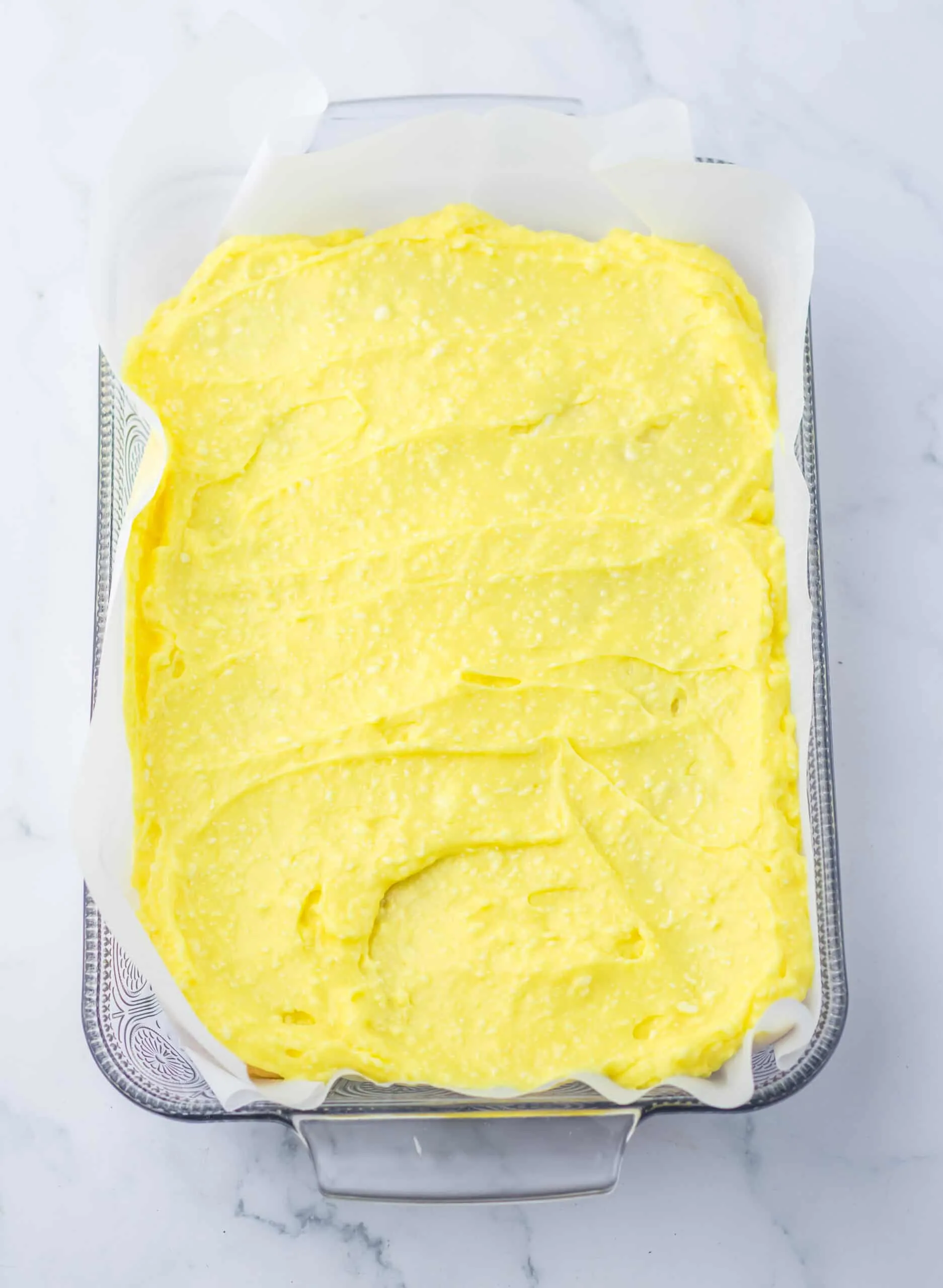Lemon Icebox Cake spoon half of pudding mixture