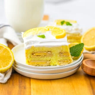 Lemon Icebox Cake served with lemon with glass of milk