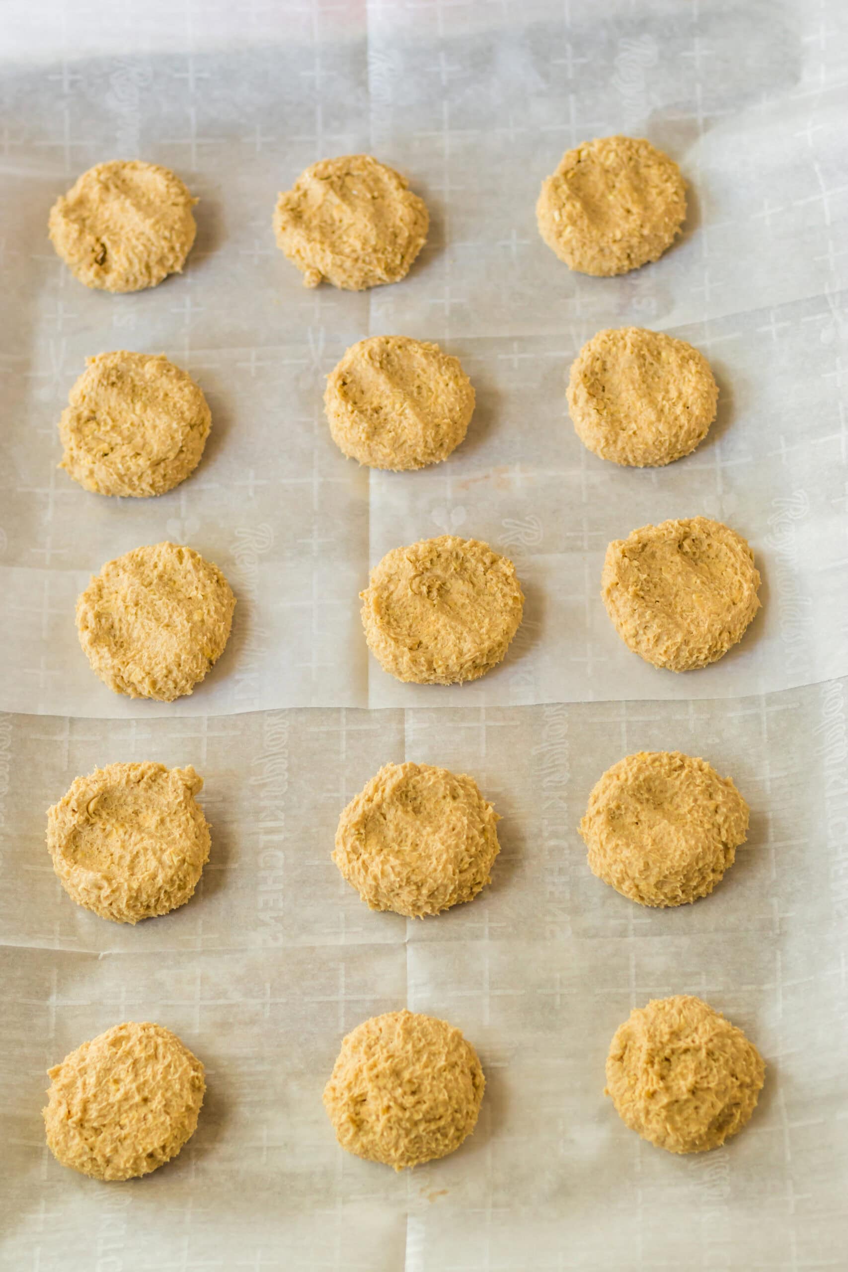 cookie dough parchment lined baking sheet