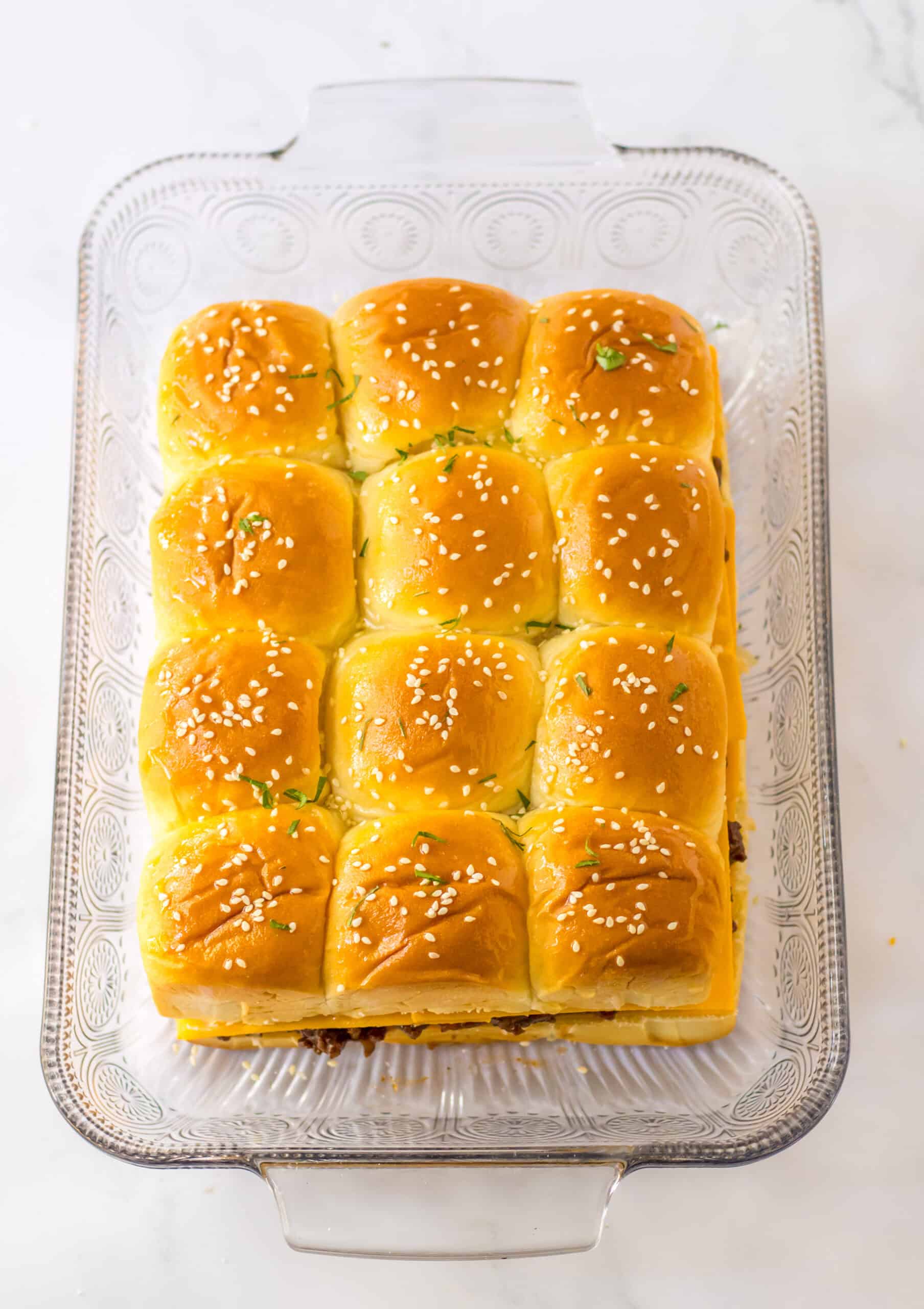 sprinkle buns with sesame seeds