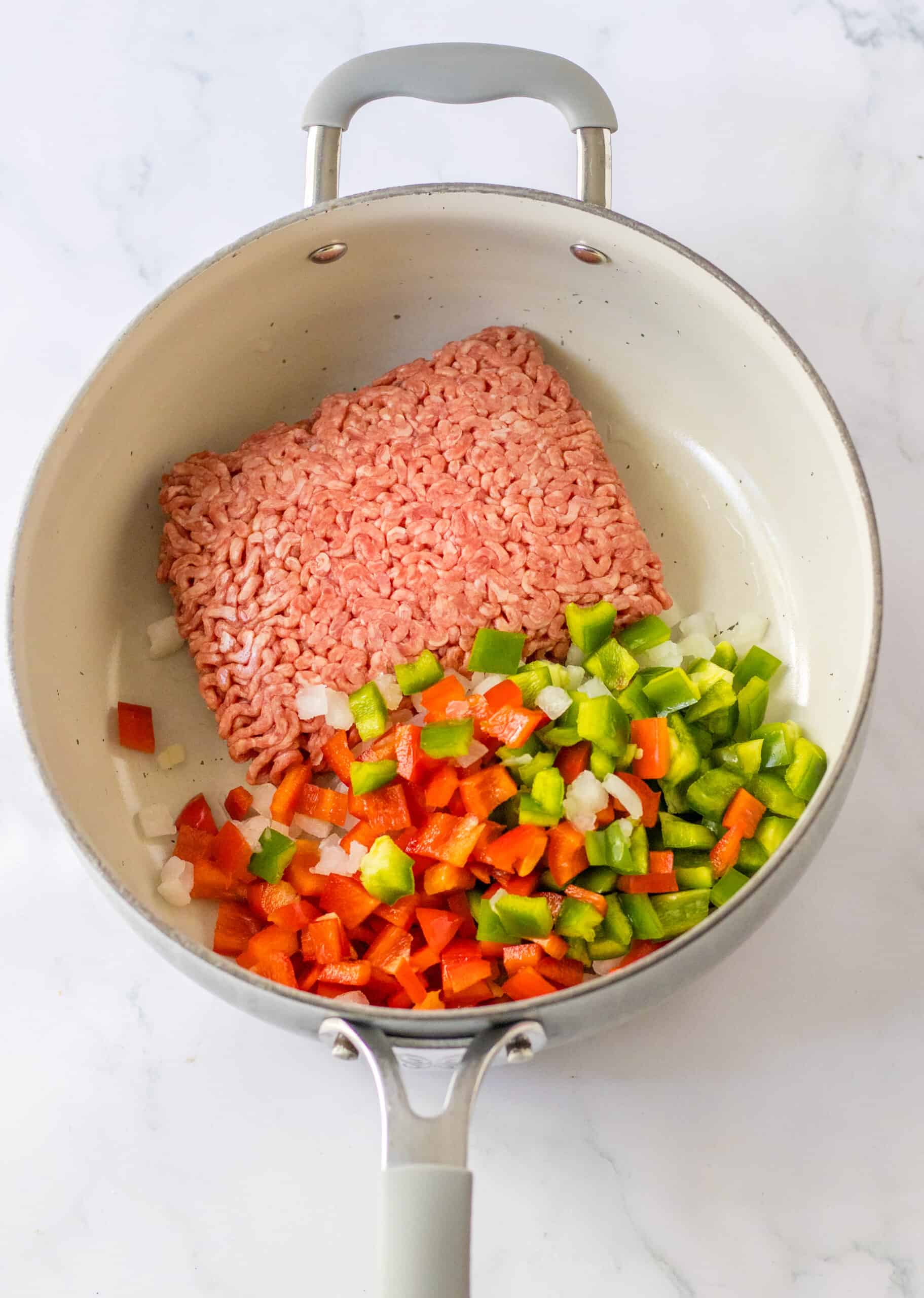 ground beef onions pepper in skillet