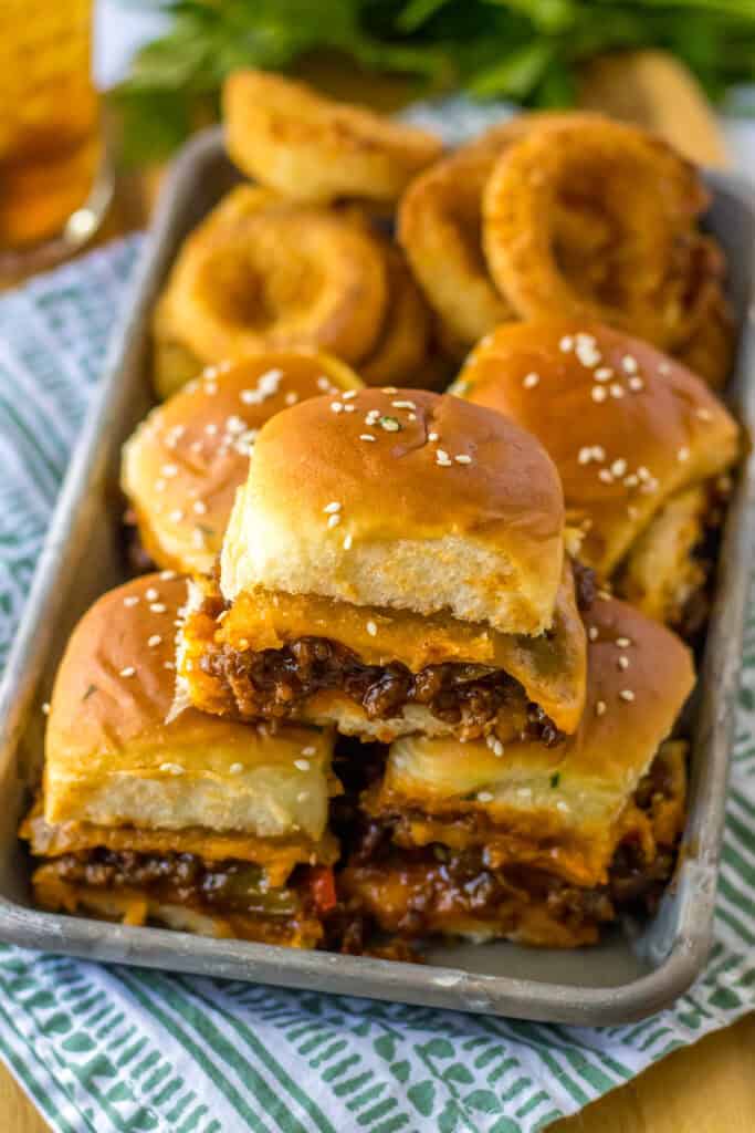 tray of sloppy joe sliders and onion rings