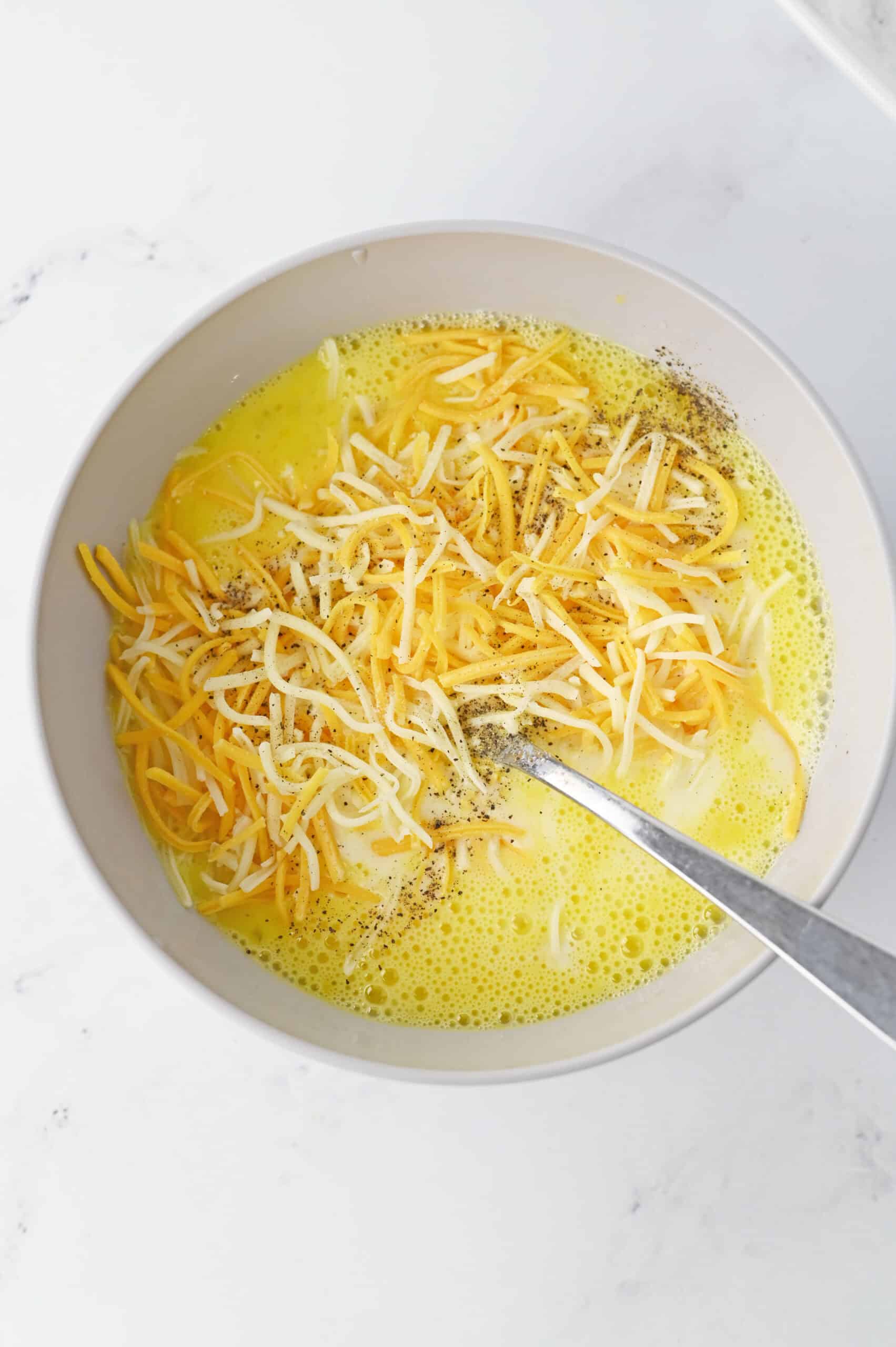 eggs and cheese in bowl