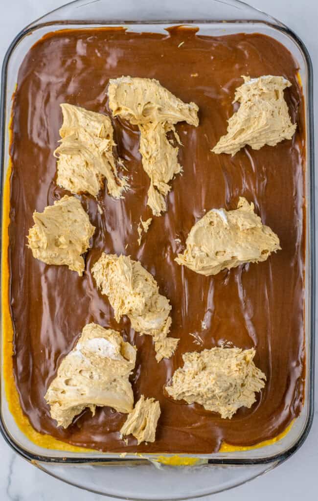add pb swirl on top Peanut Butter Poke Cake