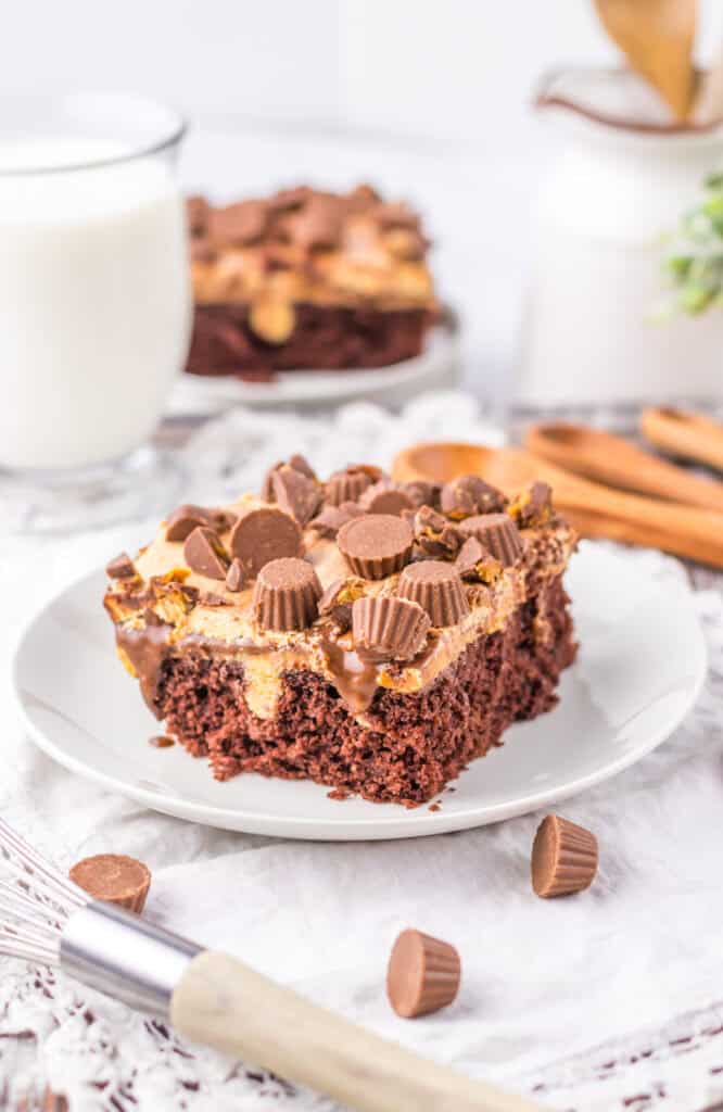 slice served Peanut Butter Cup Poke Cake