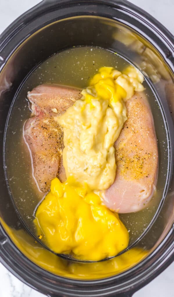 add cream of chicken soups to chicken