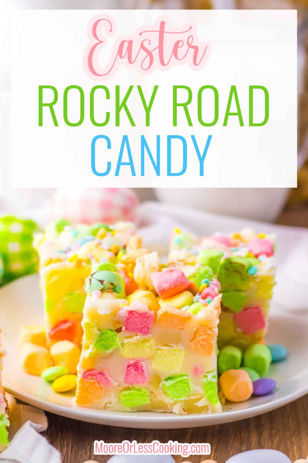 This Easter Rocky Road Candy is the best no bake Easter treat! White chocolate combines with butter to create a creamy base for pastel mini marshmallows, chocolate candies and macadamia nuts. Topped with Easter sprinkles this candy is always a hit and great to give away too! via @Mooreorlesscook