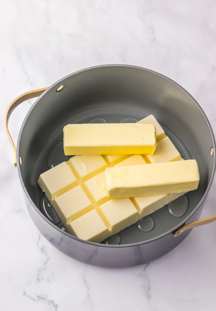 melt white chocolate in saucepan