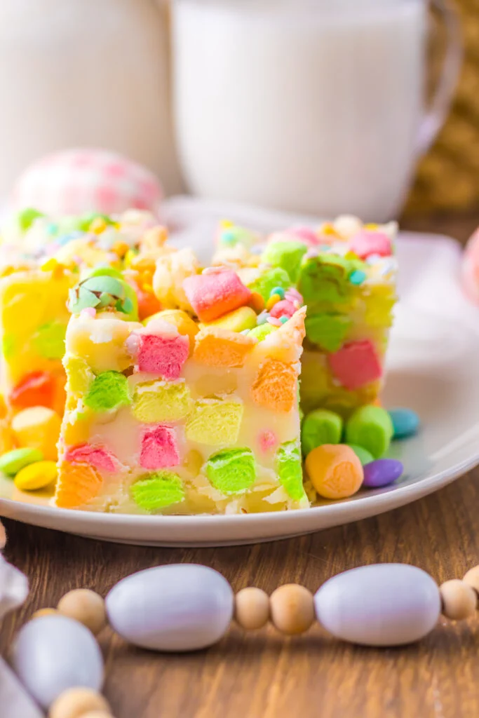 Rocky Road Candy on plate 3 piece in front glass milk