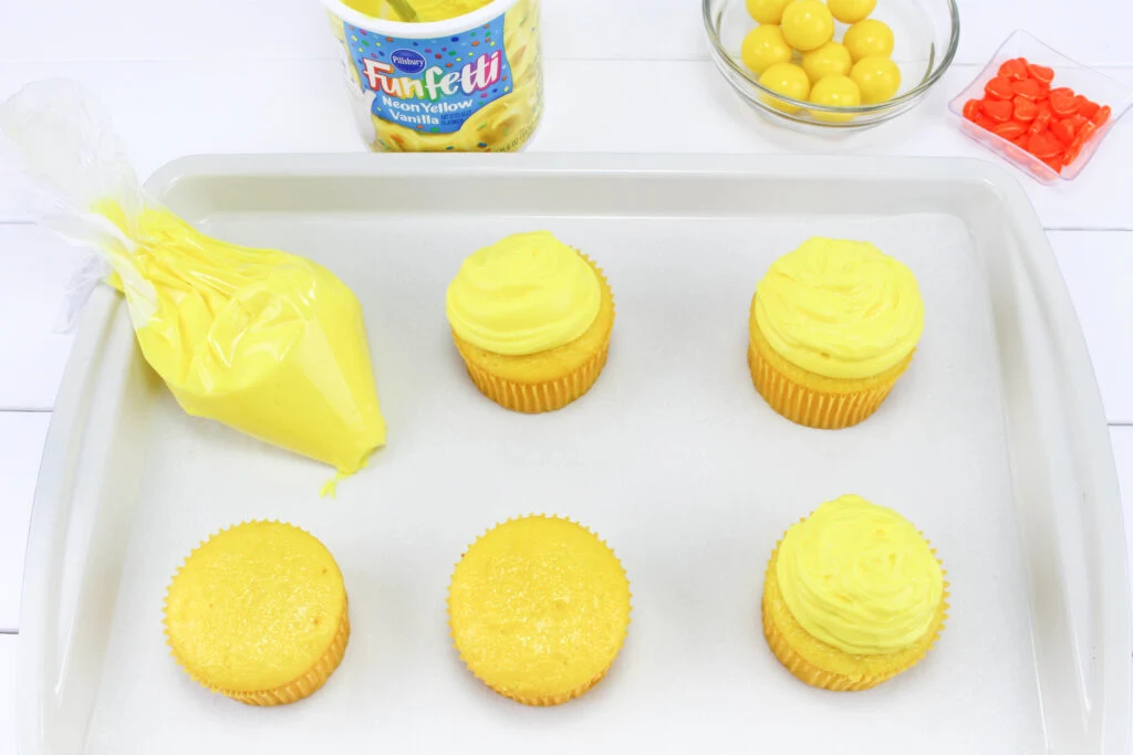 frost the yellow cupcakes