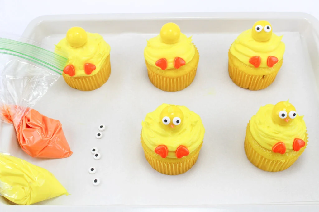 decorating the chick cupcakes