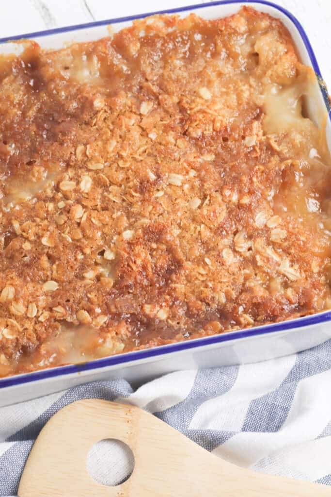 peach crisp dump cake out of the oven in casserole dish.